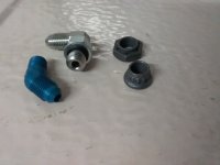 brake fluid fitting & landing gear attach nut comparisons.jpg